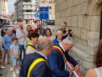 Het knippen van het lint door burgemeester Eddy Lust